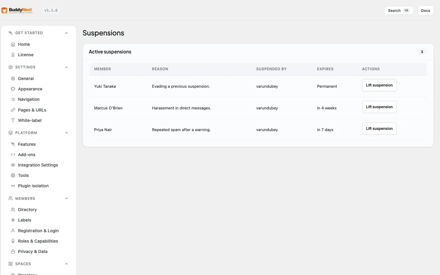 The Moderation > Suspensions tab listing suspended members and controls