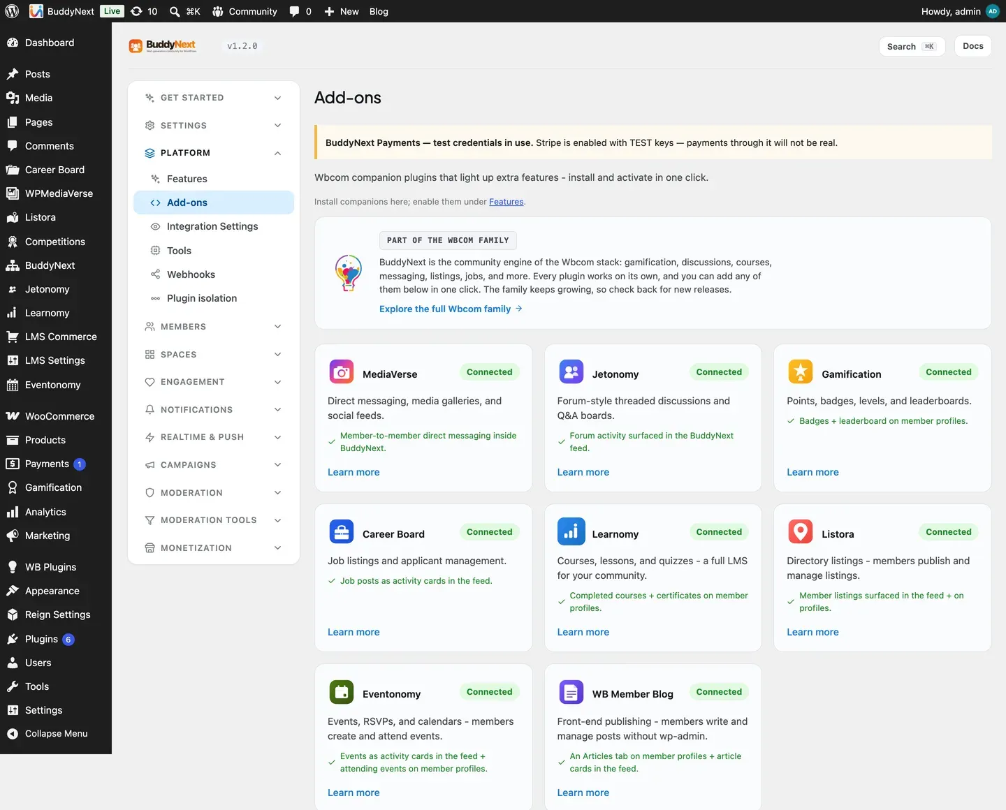 The BuddyNext Add-ons screen showing Listora connected alongside the rest of the Wbcom family, with its listings surfaced in the feed and on profiles